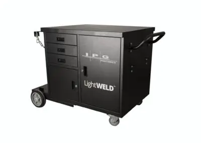 A cut-out shot of the black wheeled IPG LightWELD Welding Cart - Showing a handle for moving the cart around, as well as two cupboards and three closed drawers.