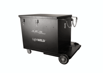 A cut-out shot of the black wheeled IPG LightWELD Welding Cart - Showing some mounting hooks, and a bottle carrier with chain for securing welding gas bottles.