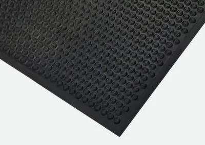 A safety mat with a circular texture on it.