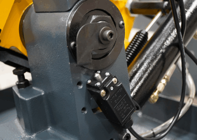 A close-up shot of the gravity down-feed system on a Sterling Swift 280 Bandsaw